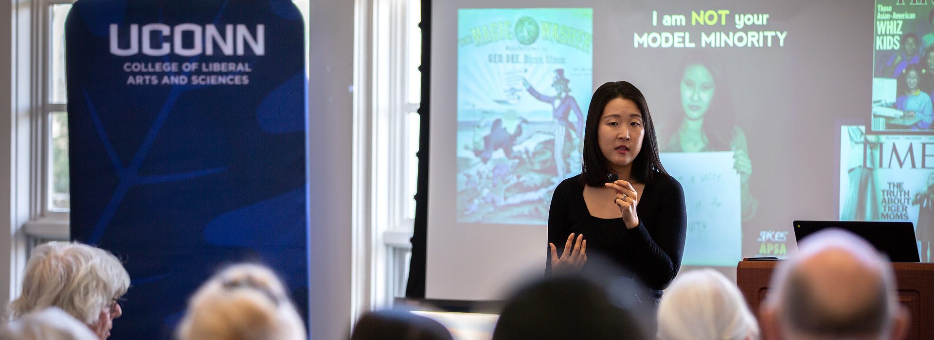 A professor of Asian and Asian American Studies presents during a course for UConn alumni.