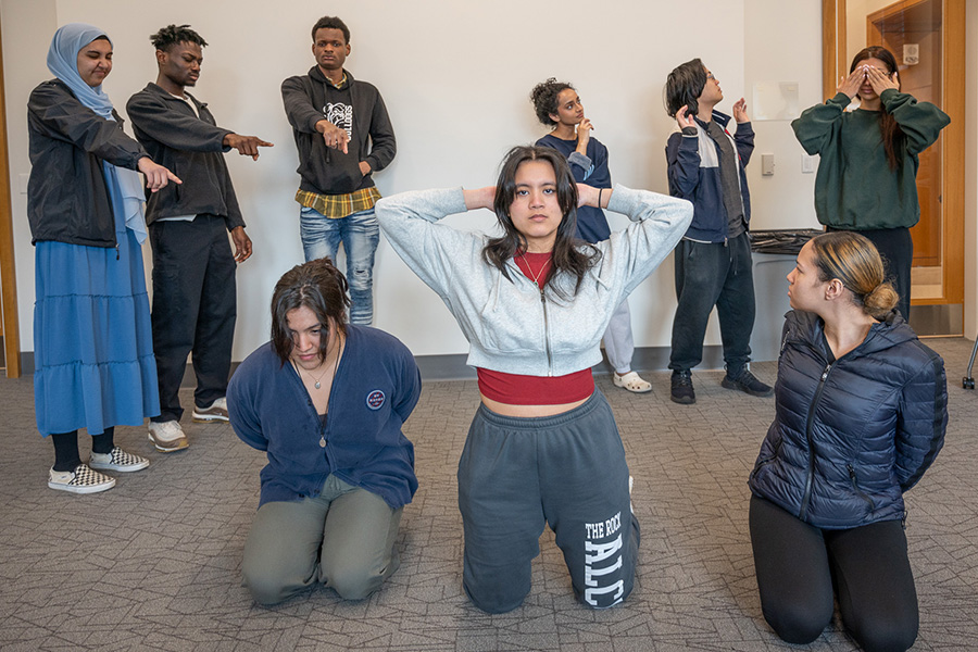 Students act out a scenario in an Asian and Asian American Studies course. 