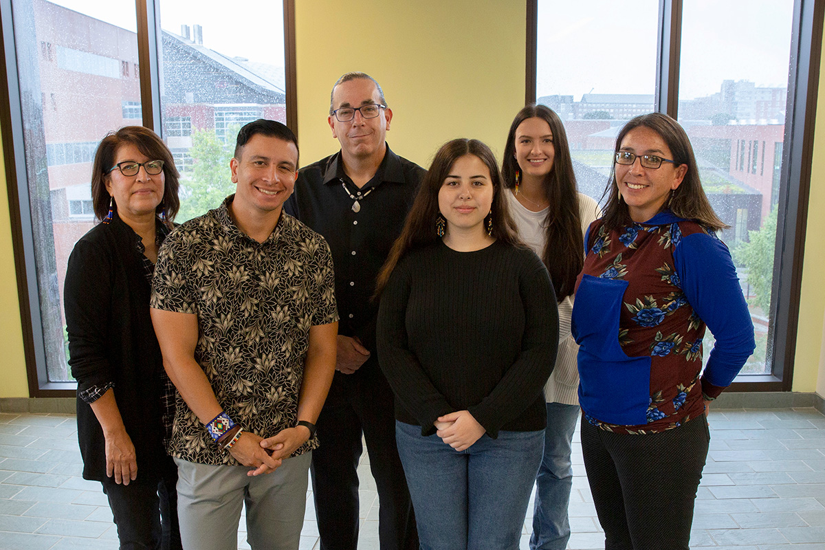 A professor speaks at an outreach events for Native American Cultural Programs.